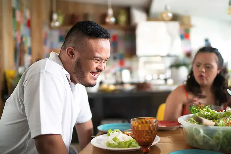 Empowering Weight Loss: A Comprehensive Guide for Individuals with Disabilities 2 Image of a disabled man and balance around nutrition to aid weight loss Witley